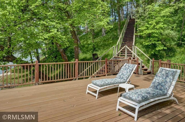 802 Flos Ct, Lincoln Twp, WI 54001 - deck featuring stairway and view of wooded area