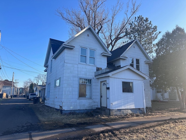 view of front of property with entry steps