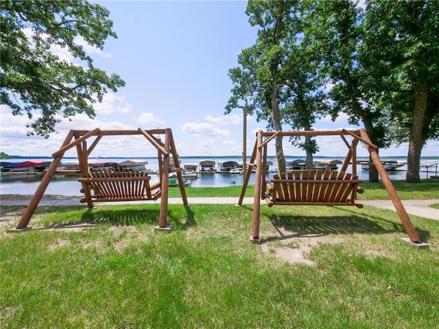 2481 Lake Miltona Dr NE Unit 1, Miltona Twp, MN 56354 - view of play area featuring a water view and a lawn