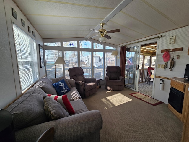 2481 Lake Miltona Dr NE Unit 1, Miltona Twp, MN 56354 - living room featuring ceiling fan, lofted ceiling, carpet floors, and a healthy amount of sunlight