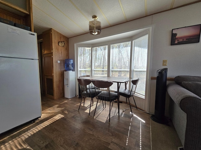 2481 Lake Miltona Dr NE Unit 1, Miltona Twp, MN 56354 - dining area with vaulted ceiling and wood finished floors