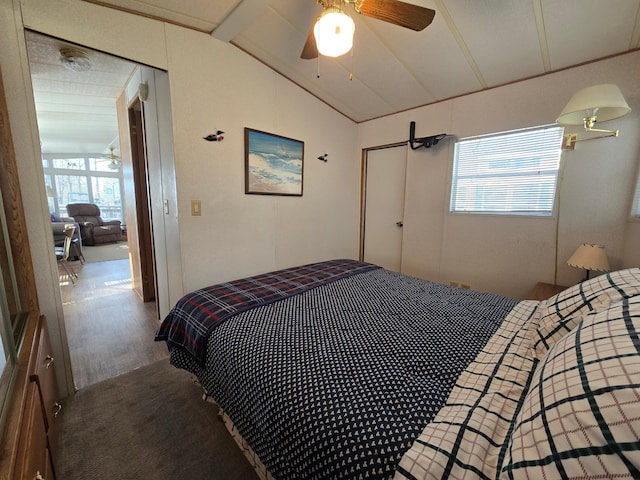 2481 Lake Miltona Dr NE Unit 1, Miltona Twp, MN 56354 - bedroom featuring wood finished floors, lofted ceiling with beams, and ceiling fan