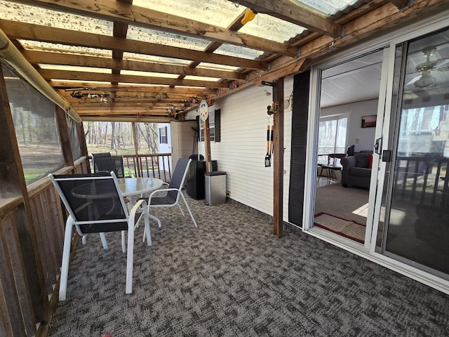 2481 Lake Miltona Dr NE Unit 1, Miltona Twp, MN 56354 - sunroom featuring outdoor dining space
