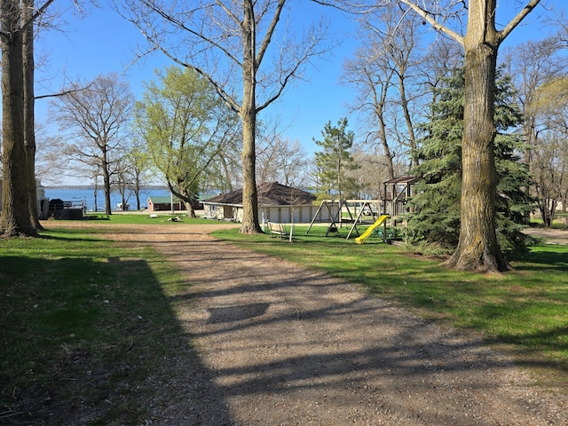 2481 Lake Miltona Dr NE Unit 1, Miltona Twp, MN 56354 - view of community with a water view, playground community, and a lawn