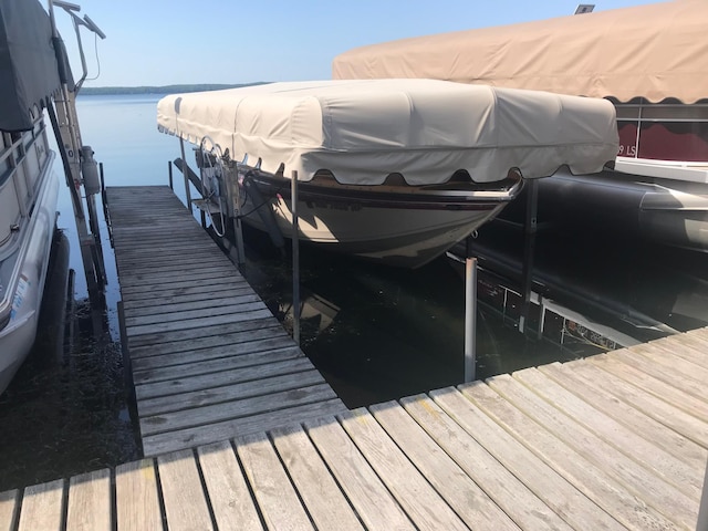 2481 Lake Miltona Dr NE Unit 1, Miltona Twp, MN 56354 - view of dock featuring a water view and boat lift