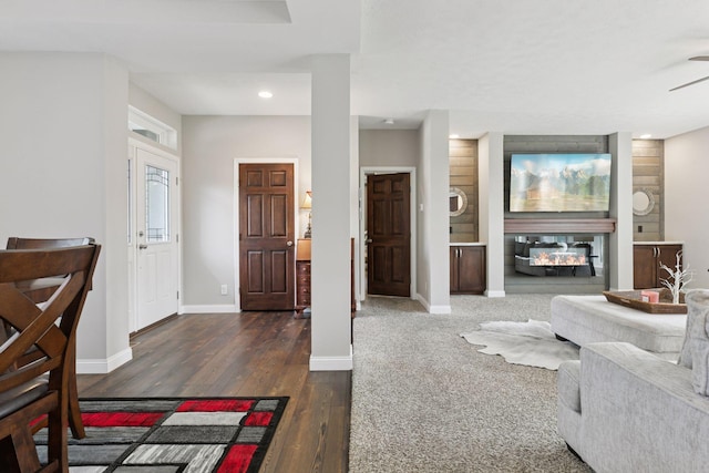 21212 Old Lake George Blvd NW, Oak Grove, MN 55303 - living area with baseboards, recessed lighting, wood finished floors, a multi sided fireplace, and ceiling fan