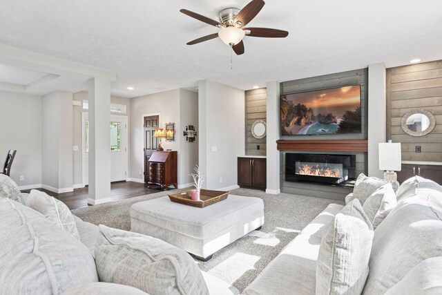 21212 Old Lake George Blvd NW, Oak Grove, MN 55303 - living area with baseboards, a ceiling fan, a glass covered fireplace, and recessed lighting