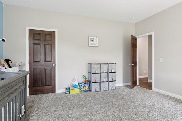 21212 Old Lake George Blvd NW, Oak Grove, MN 55303 - carpeted bedroom featuring baseboards