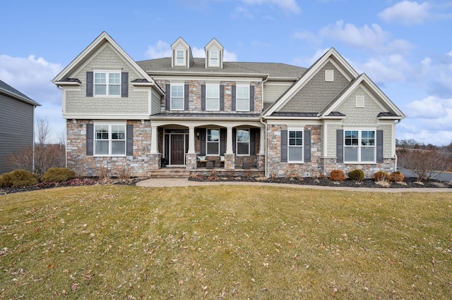 16302 Sohm Ct, Eden Prairie, MN 55347 - craftsman inspired home featuring a porch, roof with shingles, stone siding, a front yard, and a standing seam roof