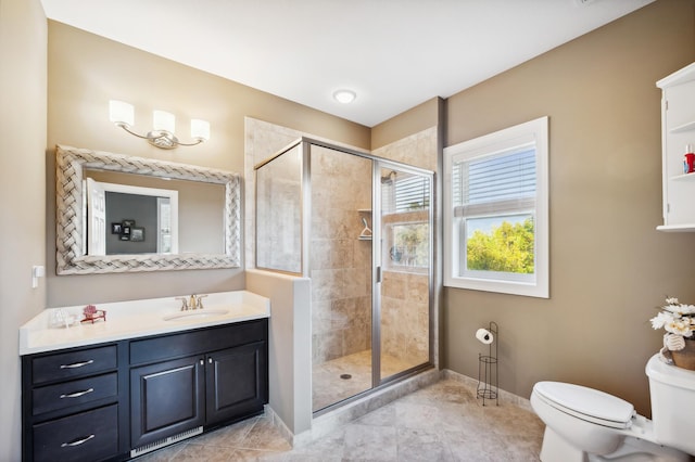 16302 Sohm Ct, Eden Prairie, MN 55347 - full bathroom with a stall shower, vanity, toilet, and baseboards