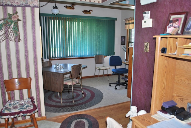 office space with carpet flooring and baseboards