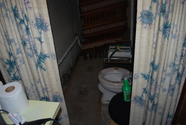 bathroom featuring toilet