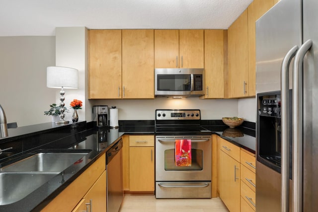 401 1st St Unit 1321, Minneapolis, MN 55401 - kitchen with stainless steel appliances and dark stone counters