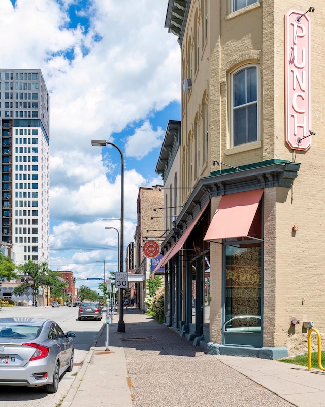 401 1st St Unit 1321, Minneapolis, MN 55401 - view of asphalt road featuring sidewalks, street lighting, traffic signs, and curbs
