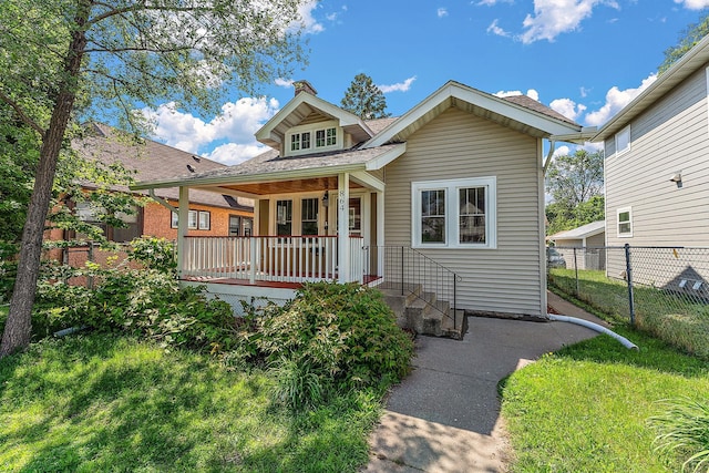 864 Fuller Ave, Saint Paul, MN 55104 - bungalow-style house featuring covered porch and a chimney