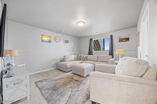 living room with carpet floors and baseboards