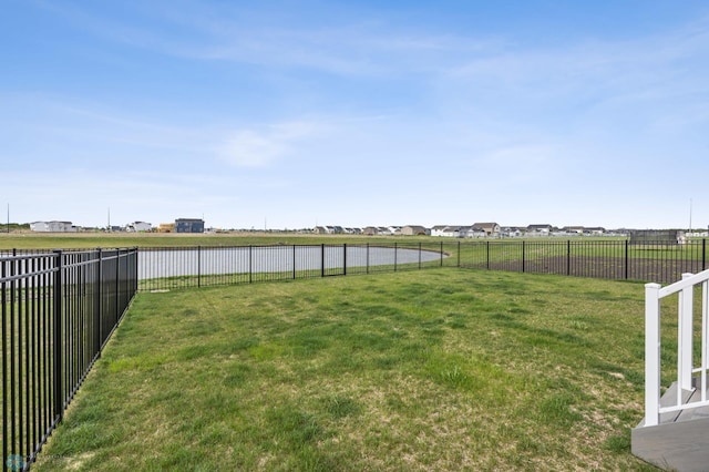 view of yard featuring a water view