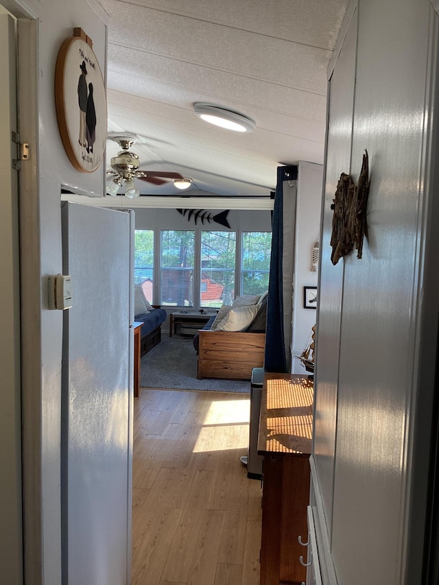 hallway with wood finished floors