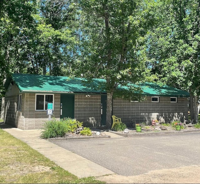 view of front of home featuring metal roof