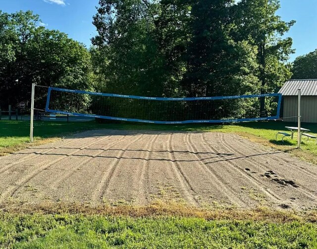 surrounding community featuring volleyball court