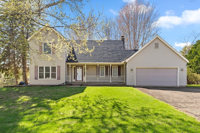 traditional-style home featuring covered porch, driveway, an attached garage, a shingled roof, and a front yard