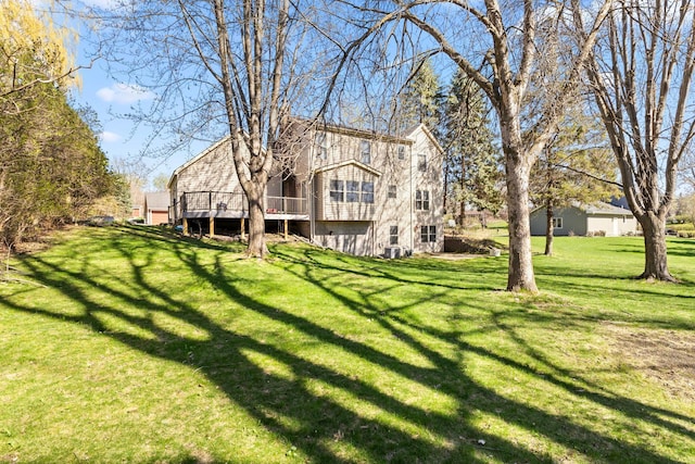 1900 Vernon Dr S, Minnetonka, MN 55305 - rear view of house featuring a yard and a wooden deck