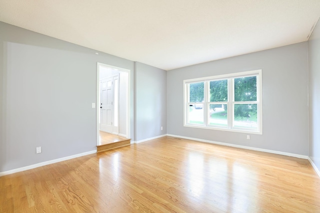 1900 Vernon Dr S, Minnetonka, MN 55305 - spare room with light wood finished floors and baseboards