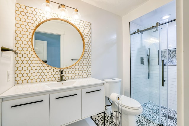 1900 Vernon Dr S, Minnetonka, MN 55305 - bathroom featuring toilet, a shower stall, vanity, and tile patterned flooring