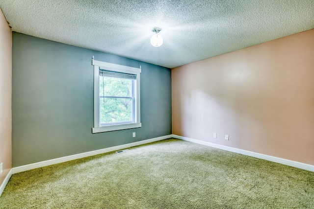 1900 Vernon Dr S, Minnetonka, MN 55305 - carpeted empty room with a textured ceiling and baseboards