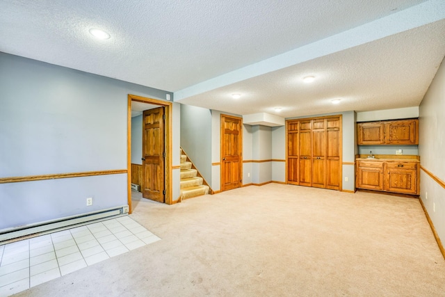 1900 Vernon Dr S, Minnetonka, MN 55305 - finished below grade area featuring light carpet, a baseboard heating unit, stairs, a textured ceiling, and baseboards