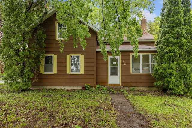 100 2nd St S, Delano, MN 55328 - view of front facade with a chimney