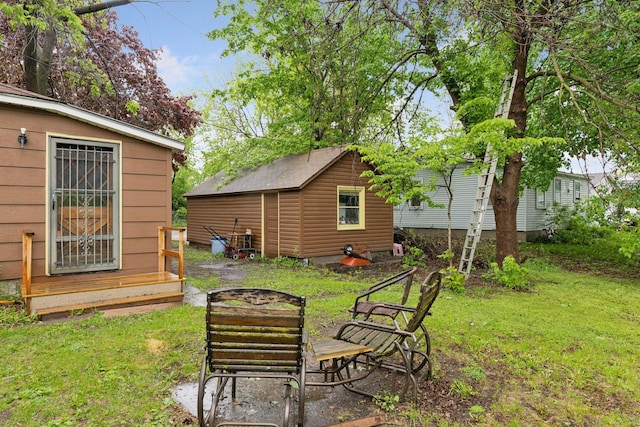 100 2nd St S, Delano, MN 55328 - view of green lawn featuring an outdoor structure