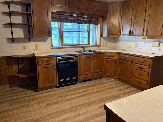 314 Burr Oak Dr, Albert Lea, MN 56007 - kitchen featuring open shelves, a sink, dishwasher, and light countertops