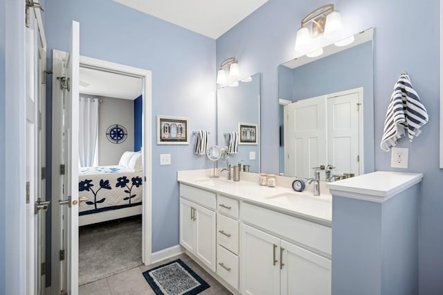 20109 Geneva Trl, Lakeville, MN 55044 - full bath with double vanity, ensuite bath, tile patterned flooring, and baseboards
