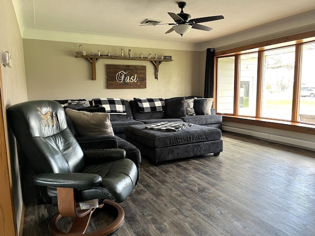 2250 18th Ave, Windom, MN 56101 - living room with wood finished floors, a ceiling fan, and a baseboard radiator