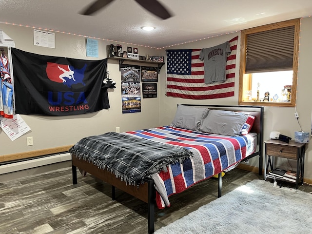 2250 18th Ave, Windom, MN 56101 - bedroom featuring wood finished floors, a textured ceiling, and recessed lighting