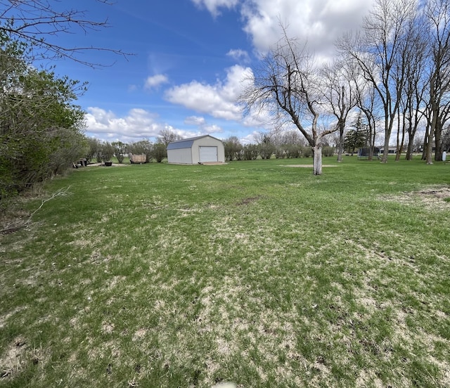 2250 18th Ave, Windom, MN 56101 - view of grassy yard featuring an outdoor structure