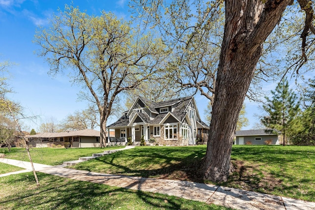 204 8th Ave S, Princeton, MN 55371 - view of front of property featuring a front yard and stone siding