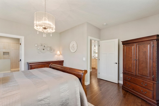 204 8th Ave S, Princeton, MN 55371 - bedroom featuring dark wood-style floors, a chandelier, and ensuite bathroom