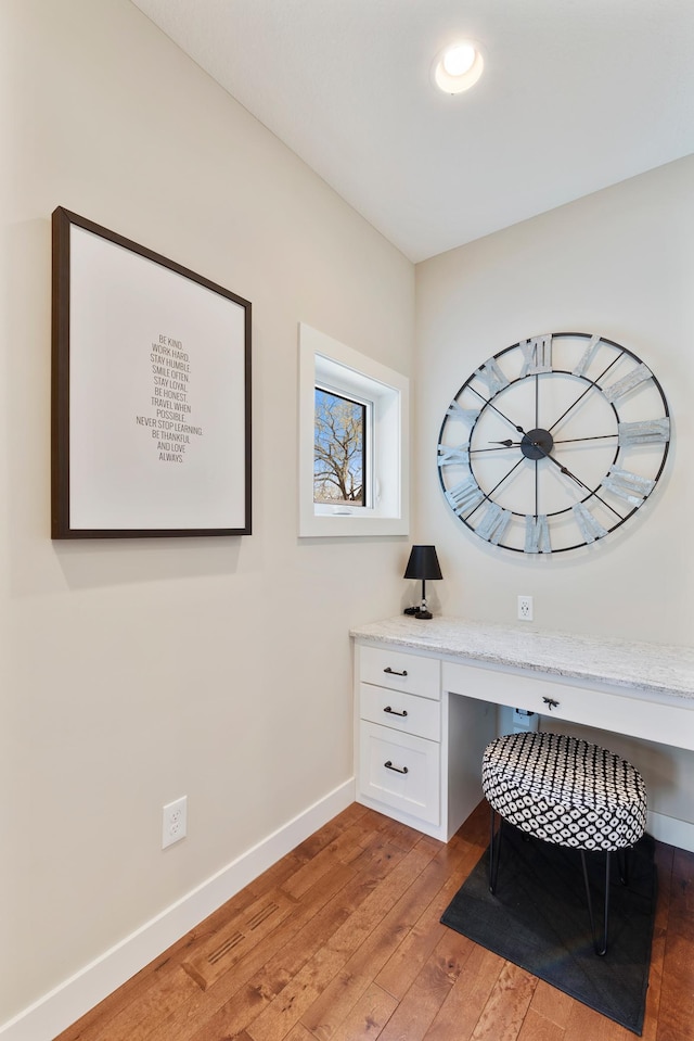 204 8th Ave S, Princeton, MN 55371 - office area with built in desk, light wood-style floors, and recessed lighting