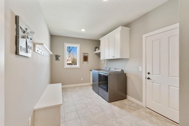 204 8th Ave S, Princeton, MN 55371 - laundry room featuring cabinet space, washing machine and dryer, recessed lighting, a textured ceiling, and light tile patterned floors