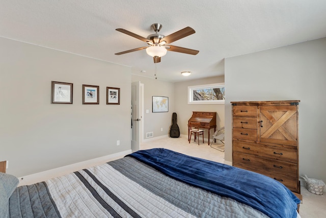 204 8th Ave S, Princeton, MN 55371 - carpeted bedroom featuring baseboards and ceiling fan
