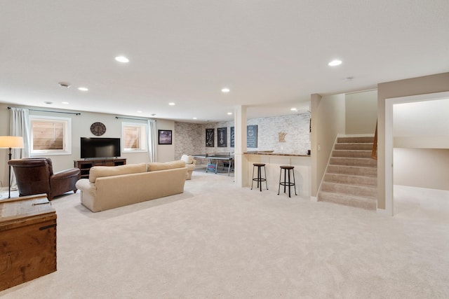 204 8th Ave S, Princeton, MN 55371 - carpeted living room featuring stairway and recessed lighting