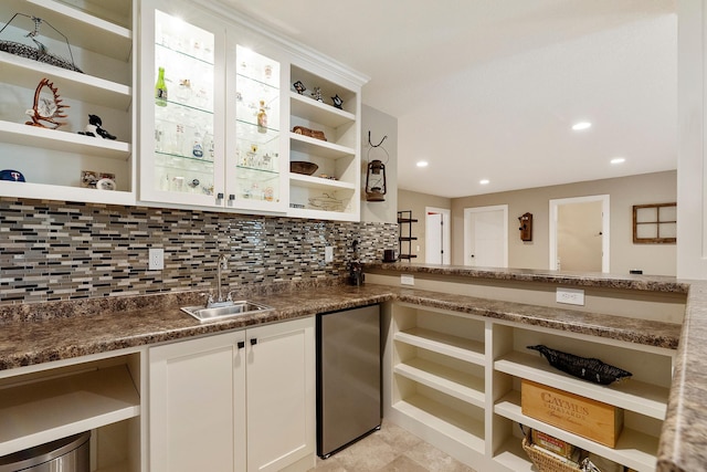 204 8th Ave S, Princeton, MN 55371 - kitchen featuring open shelves, fridge, decorative backsplash, white cabinets, and recessed lighting