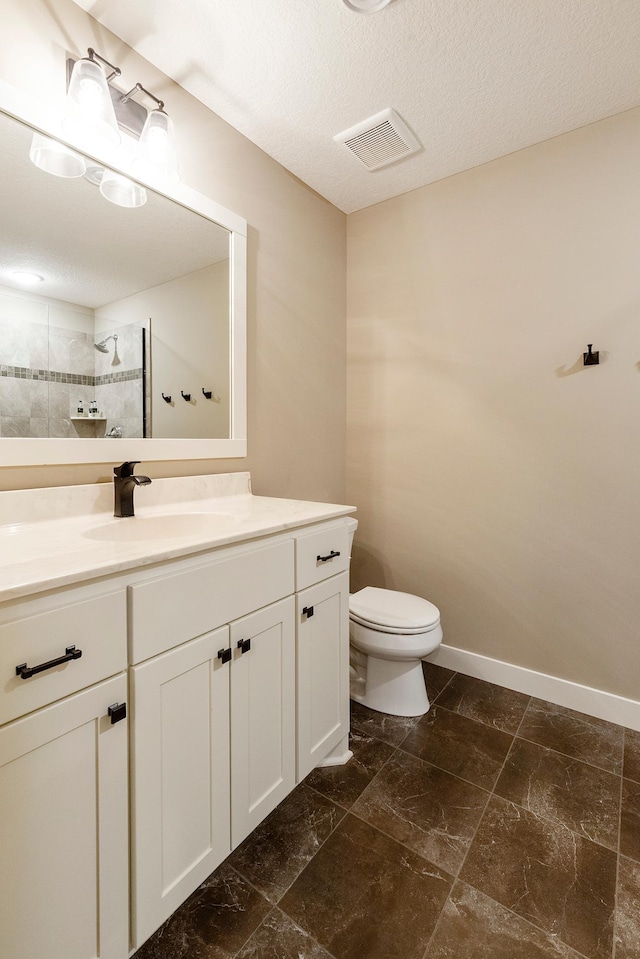 204 8th Ave S, Princeton, MN 55371 - full bathroom with vanity, tiled shower, and a textured ceiling