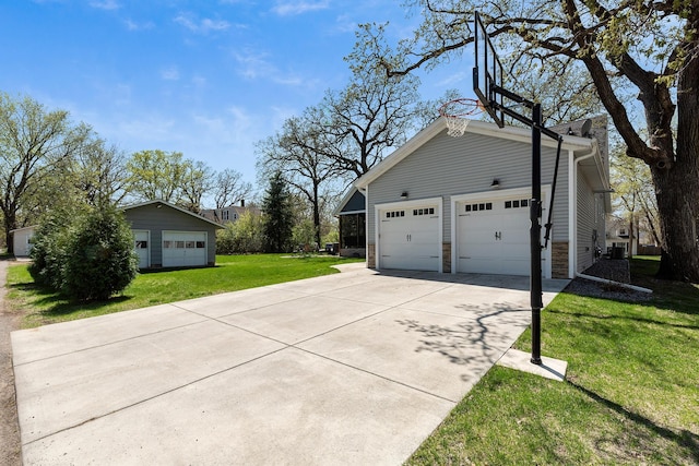 204 8th Ave S, Princeton, MN 55371 - view of property exterior featuring a yard, driveway, and an outdoor structure