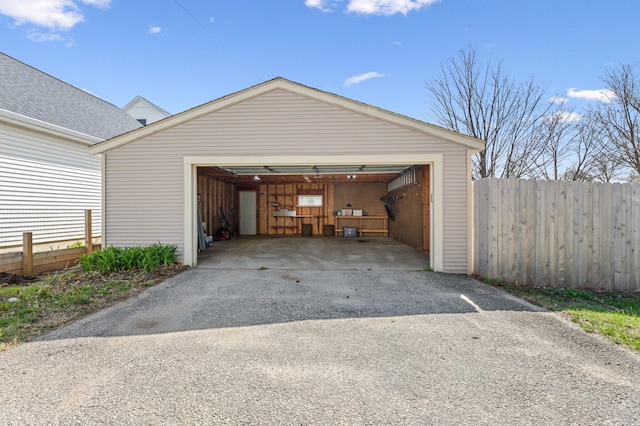 detached garage with fence