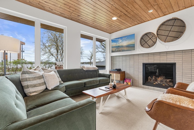 4919 Three Points Blvd, Mound, MN 55364 - living room featuring wooden ceiling, a tiled fireplace, and recessed lighting