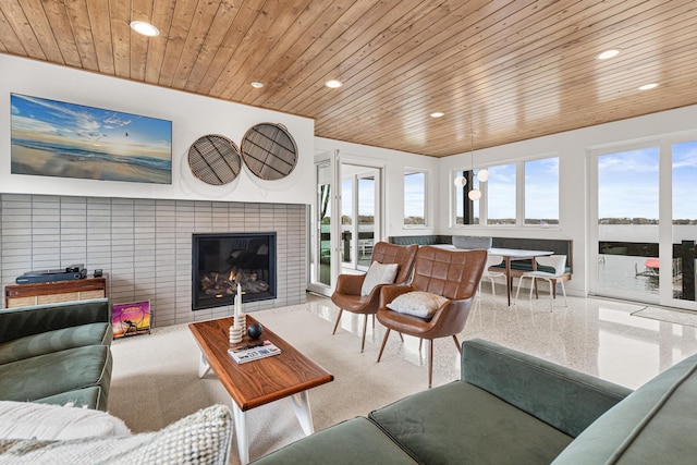 4919 Three Points Blvd, Mound, MN 55364 - living area with a tile fireplace, recessed lighting, and wooden ceiling