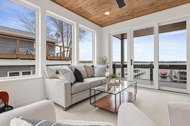 4919 Three Points Blvd, Mound, MN 55364 - sunroom / solarium featuring recessed lighting, carpet, wooden ceiling, baseboards, and a water view